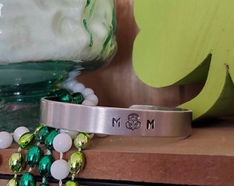 Mom with a Claddagh stamp cuff bracelet