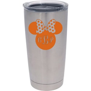 May include: A stainless steel tumbler with a black lid. An orange Minnie Mouse design is on the front, featuring a polka dot bow and the initials "CLP" in a decorative font. The tumbler is designed to keep drinks cold or hot.