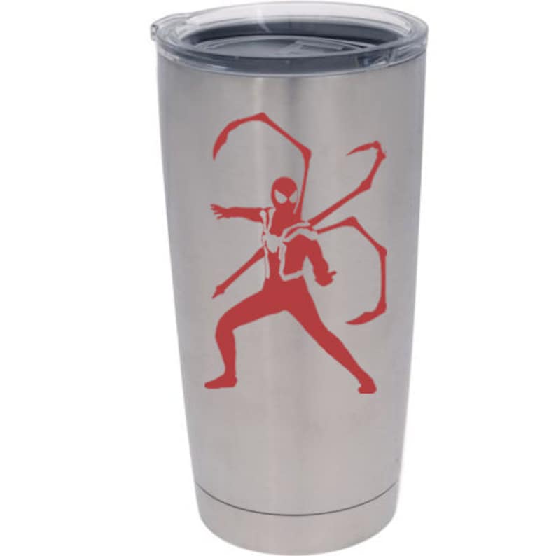 May include: A stainless steel tumbler with a black lid. The tumbler features a red graphic of a superhero in a dynamic pose with multiple appendages. The design is a bold, eye-catching accent on the insulated travel mug.