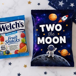 May include: Two snack bags are displayed. One is a blue Welch's Fruit Snacks package with fruit illustrations. The other is a dark blue bag with the text "TWO the MOON", an astronaut, a rocket, and planets.