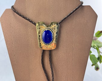 Bolo Tie, Gold Etched Shield with Blue stone
