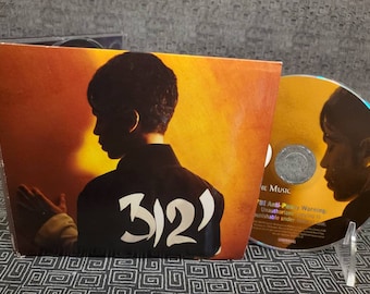 Prince CD 紫色シンボルデザイン 外装一部剥がれ有り PRINCEを中心に