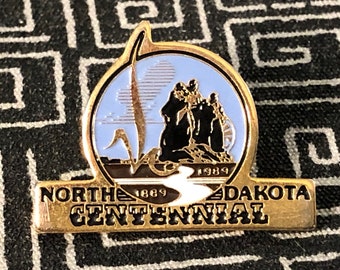 NORTH DAKOTA CENTENNIAL 1889-1989 metal pin - Flickertail State - 100 years a state celebration - Minot - Fargo - Bismark - Garrison
