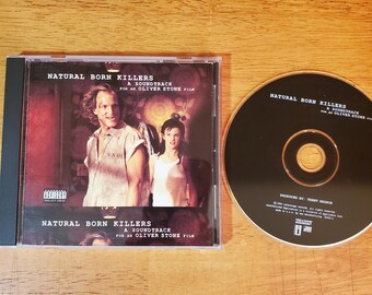 CD con la banda sonora de la película Natural Born Killers - Nine Inch Nails - Jane's Addiction - Dr. Dre - Oliver Stone - 1994