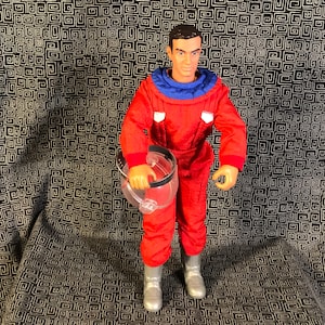 Power Team Power Astronaut 12&quot; or 30.5cm fully poseable action figure - brown haired male with red jumpsuit, helmet and silver moon boots