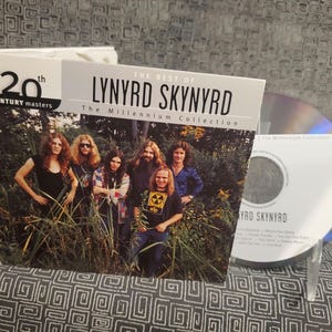 Lynyrd Skynyrd Greatest Hits CD - Millennium Collection - Best Of Compact Disc - Southern Rock Legends - Freebird - Sweet Home Alabama