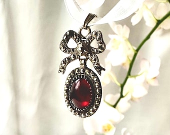 Antique Sterling Silver Pendant with Garnet Glass Enamel French Baroque Lovers Knot with cut Steel Detail