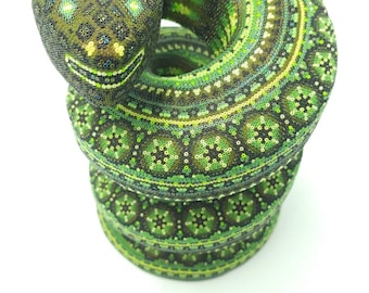 Snake Huichol Hand Beaded Mask By Cecilia Carrillo measures 8" long, and is 5.5" wide. pp6474