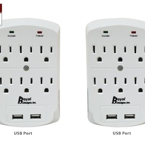 May include: A set of two white surge protectors with six outlets and two USB ports each. The surge protectors have a green light indicating grounded and a red light indicating protected. The surge protectors are labeled "Royal Designs, Inc."