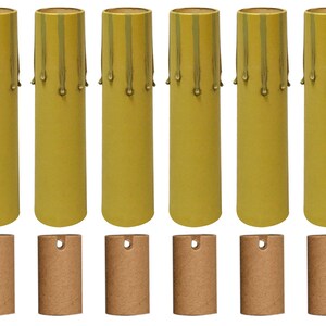 May include: Set of eight yellow taper candles with gold drip accents and eight brown candle holders.