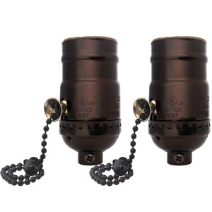 May include: Two antique bronze light bulb sockets with pull chains. Each socket has a UL listed label with the text "250V 2A RUI CHE LAMPHO" and "USTED 5OZF".