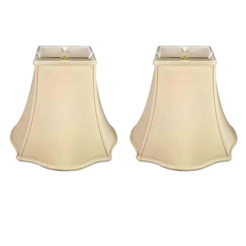 May include: A set of two beige square lampshades with scalloped edges.