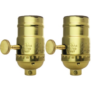 May include: Two gold-toned light bulb sockets with a side switch. The sockets are labeled "UL Listed" and "250V 15A".