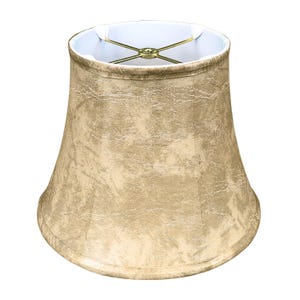 May include: A beige lampshade with a textured, distressed finish. The shade has a bell shape and a white lining.
