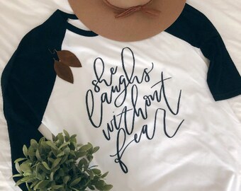 Hand Lettered 3/4 Sleeve Raglan Baseball Tee | She Laughs without Fear | Proverbs 31 Woman | Christian Tee |