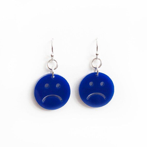 Sad face earrings deals
