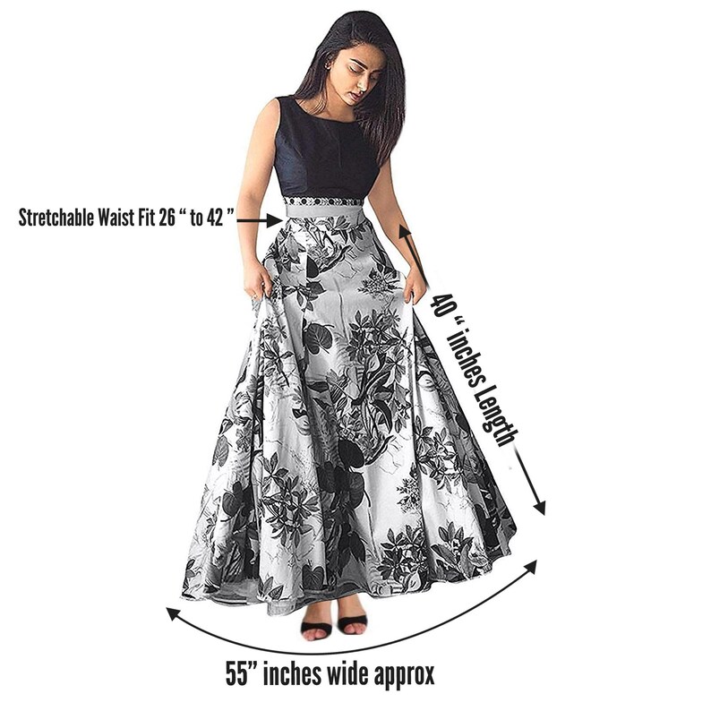 May include: A sleeveless dress with a black bodice and a grey skirt featuring a black floral print. Text indicates a stretchable waist fit of 26 to 42 inches, a 40-inch length, and a width of approximately 55 inches at the hem.