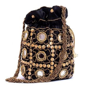 May include: Black drawstring bag with gold embellishments and a beaded strap. The bag features a pattern of gold sequins and circular mirrors, creating a decorative and ornate design. The bag is made of a soft, velvet-like material.