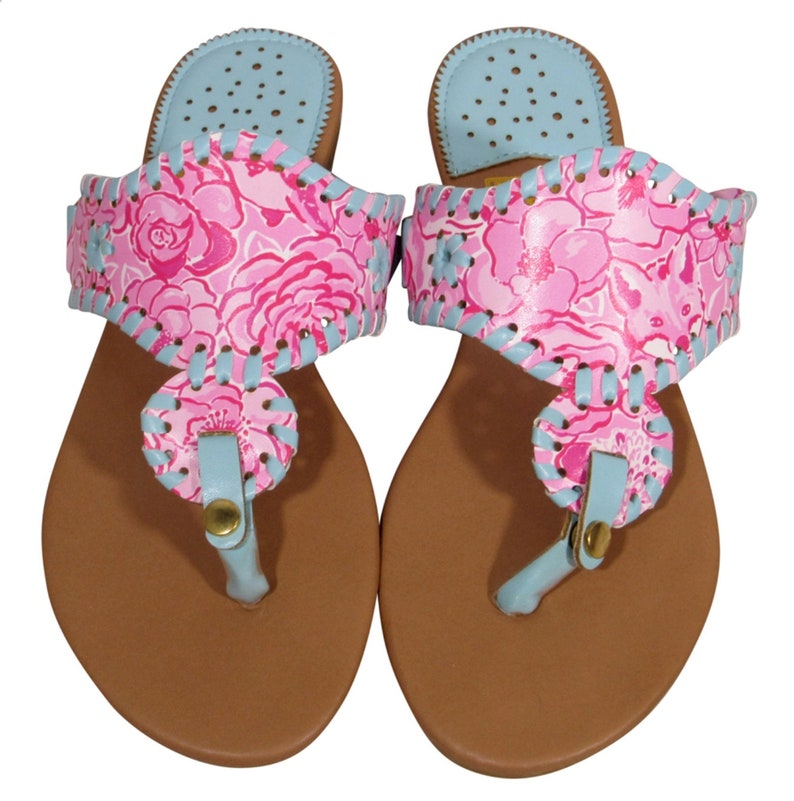 medallion flip flops
