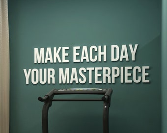 May include: A home gym featuring two black treadmills on grey mats. The room has wooden flooring, teal walls, and a window with beige curtains. The text "MAKE EACH DAY YOUR MASTERPIECE" is displayed on the wall.
