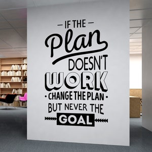 May include: Black and white motivational quote wall decal with the text "If the plan doesn't work, change the plan, but never the goal."