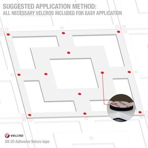 May include: A white, diamond-shaped frame with red dots around the perimeter. The frame is made of a thick, rigid material and has a smooth surface. The frame is designed to be attached to a wall using adhesive Velcro strips. The image shows the suggested application method for the frame, with the Velcro strips attached to the back of the frame. The text "SUGGESTED APPLICATION METHOD: ALL NECESSARY VELCROS INCLUDED FOR EASY APPLICATION" is printed at the top of the image. The text "VELCRO XB 25 Adhesive Velcro tape" is printed at the bottom of the image.