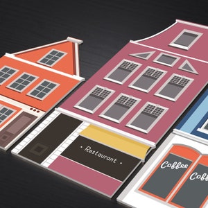 May include: Illustration of three colorful buildings with storefront signs. The building on the left is orange with a red roof. The middle building is pink with a yellow awning and a sign that says "Restaurant". The building on the right is white with a blue roof and a sign that says "Coffee".