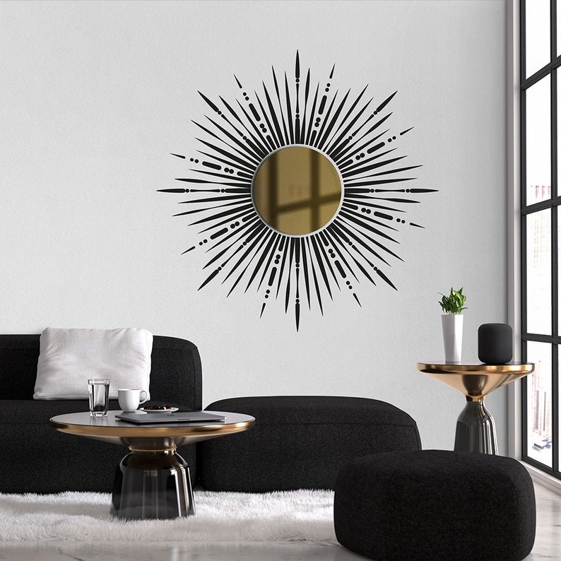 Wall Decor 3D: Gold acrylic sun, with black self-adhesive vinyl rays on a white wall in a living room.