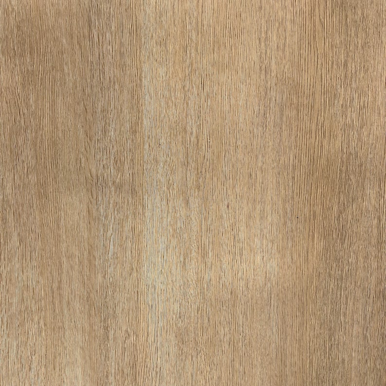 May include: A close-up of a wood grain texture. The wood has a light brown color with vertical lines and a slightly rough surface. The grain pattern is consistent throughout the image.