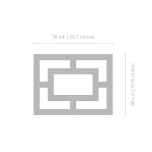 May include: A gray geometric wall decor with a square shape and an intricate pattern of overlapping rectangles. The decor measures 30.7 inches wide and 23.6 inches tall.