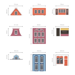 May include: Nine different illustrations of colorful buildings with various architectural styles. Each building is labeled with its dimensions in centimeters. The buildings include a red gable roof house, a red brick building with three windows, a red brick building with a shop front, a red brick building with a restaurant sign, a blue building with three windows, and a red brick building with a coffee shop sign.