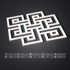 May include: White geometric wall decor with a square shape and an intricate pattern of overlapping lines. The decor is made of a lightweight material and is easy to install.