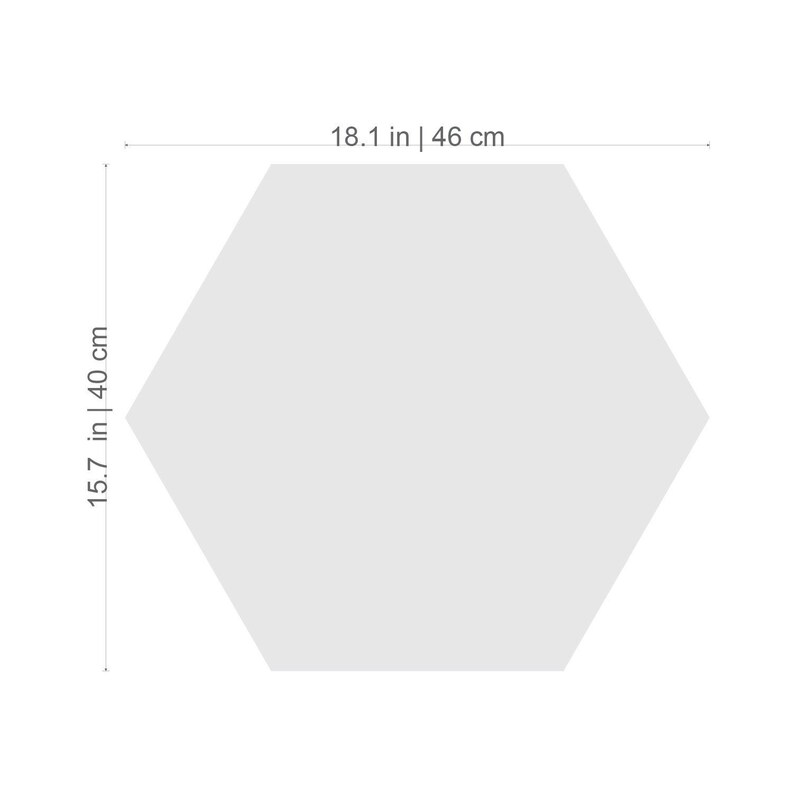 May include: A white hexagon-shaped tile with measurements of 18.1 inches by 15.7 inches, or 46 cm by 40 cm.