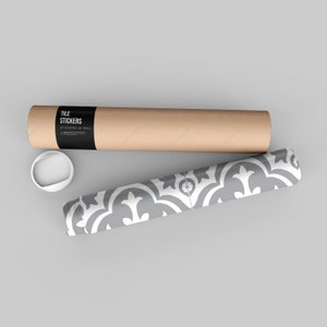 May include: A roll of tile stickers featuring a repeating gray and white floral pattern, accompanied by a brown cardboard shipping tube with a black label that reads TILE STICKERS STICKERS IN ROLL and a separate white plastic end cap.