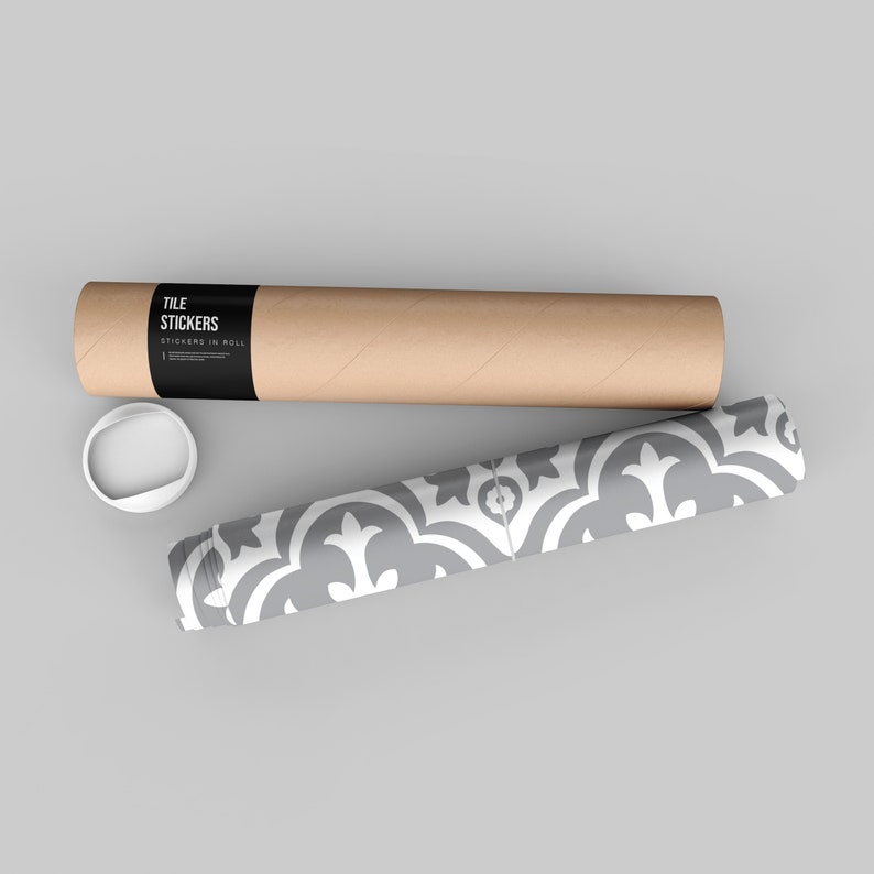 May include: A roll of tile stickers featuring a repeating gray and white floral pattern, accompanied by a brown cardboard shipping tube with a black label that reads TILE STICKERS STICKERS IN ROLL and a separate white plastic end cap.