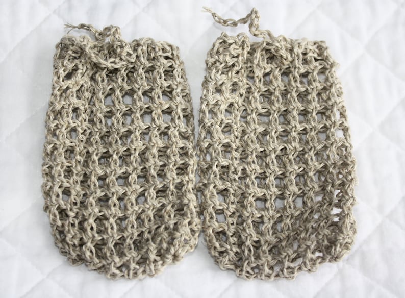 May include: Two beige crocheted mesh bags, possibly for bath or shower use.