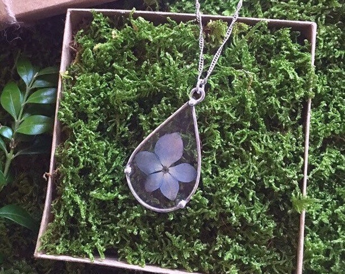 Natural blue Hydrangea dried flower set in ice resin and handcrafted sterling silver pendant necklace