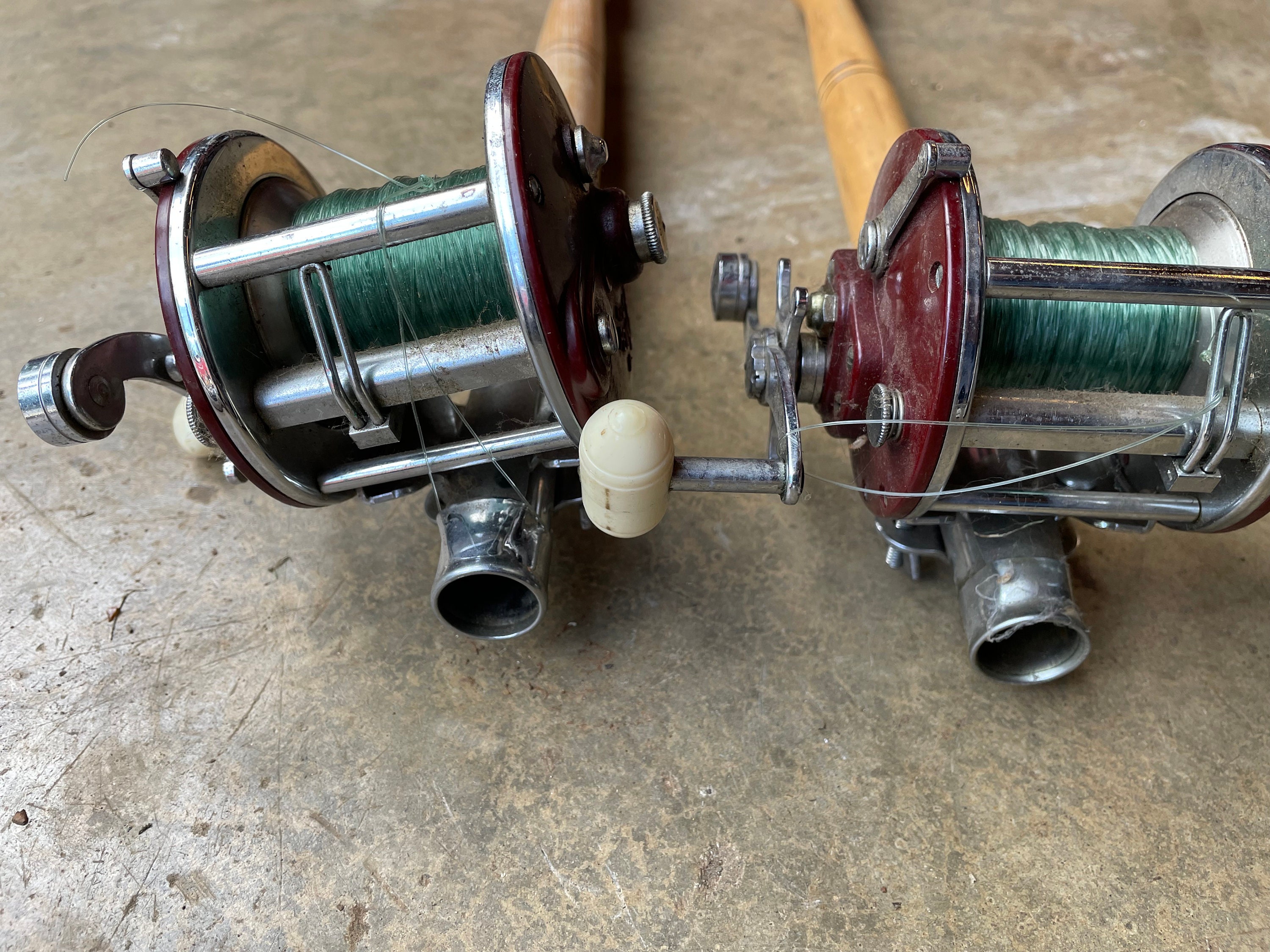 2 Matching Pair of Penn Peer No. 209 Fishing Reels With Rod Handles. 