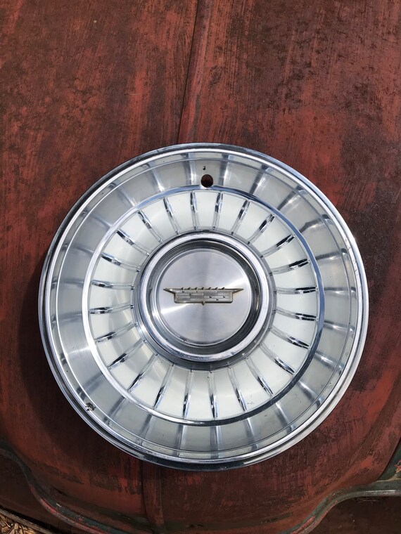 Vintage cadillac hubcaps deals