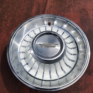 1962 cadillac hubcaps discount