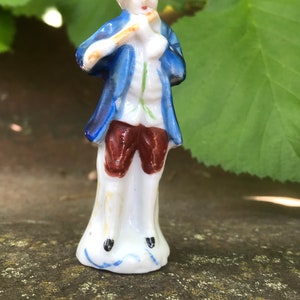 Original 1940’s Occupied Japan Colonial Blue Coat Flute Player Ceramic Figurine.