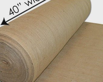 May include: A roll of tan burlap fabric with a coarse, woven texture. The fabric is unrolled to show a flat section, and a black arrow graphic with the text 40" wide indicates the width of the material across the top of the roll.