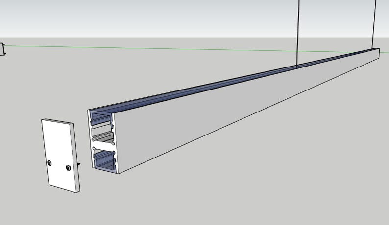 May include: A linear light fixture with a rectangular profile, shown in a 3D architectural rendering. The fixture is primarily gray with a dark blue interior and a white end cap. The design suggests a modern, minimalist aesthetic, suitable for interior lighting.