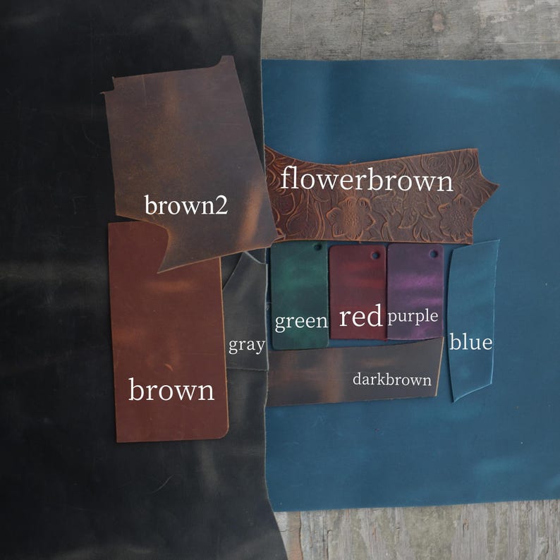 May include: A collection of leather swatches in various colors, including brown, gray, green, red, purple, and blue. The swatches are labeled with their respective colors, such as "brown2" and "flowerbrown". The background is a dark blue and black.