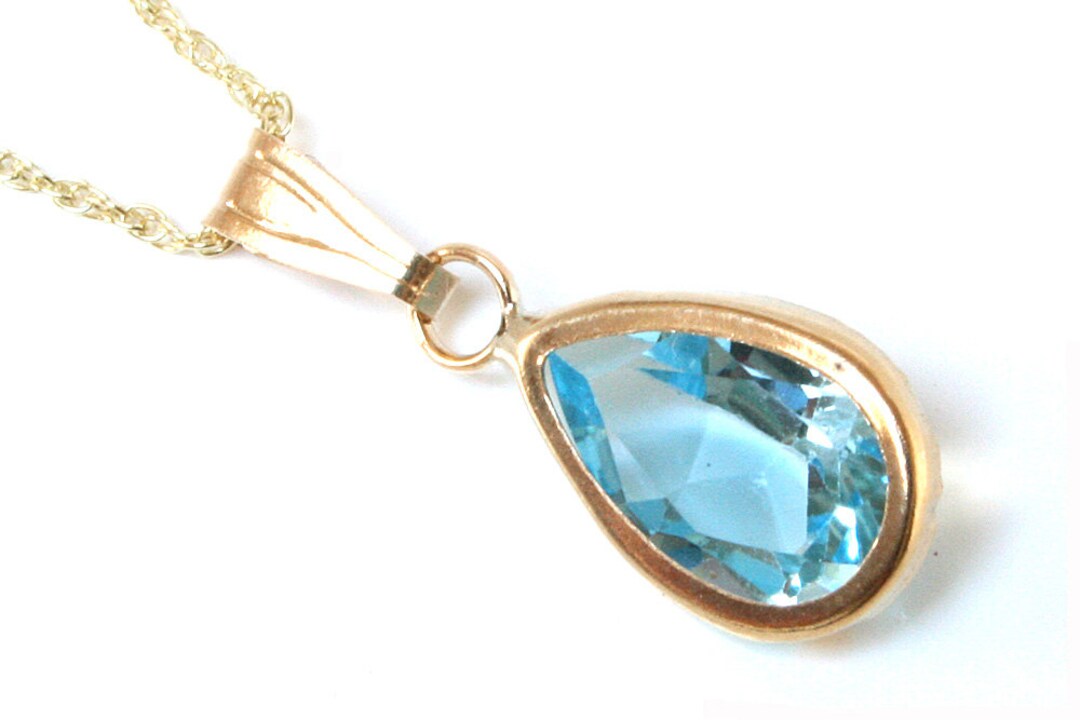 Solid 9ct Gold Blue Topaz Teardrop Pendant Necklace and 18 Inch Chain