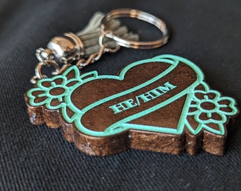 Bronze He/Him Keychain
