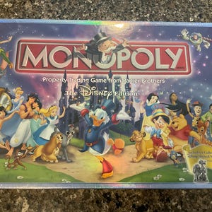 The Disney Edition - Monopoly game from Parker Brothers.