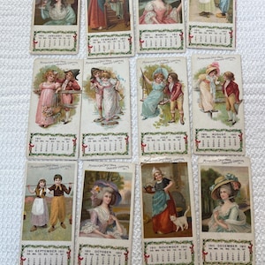Conjunto de tarjetas del calendario vintage Milwaukee Daily News de 1911, usadas
