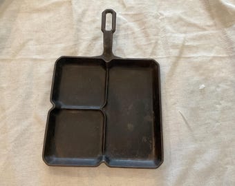 Vintage Griswold colonial breakfast skillet with divided sections