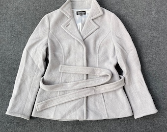 May include: A light gray wool coat with a belt and a black label that says "SONIA" on the front.
